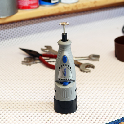 DREMEL® 7300 Cordless 4.8V Two-Speed Rotary Tool -  Designed for light-duty jobs, this compact, cordless two-speed tool is great for finishing those projects around the house.  Includes battery charger plus 6 accessory bits for carving/engraving, cleaning/polishing, cutting, sanding, grinding/sharpening and collet/miscellaneous.   Also can be used with any Dremel accessory bit with up to a  1/8" shank.