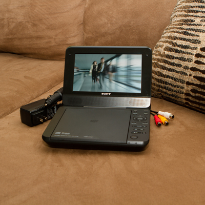 SONY® Portable DVD Player - Stay entertained where ever you go with this 7" portable DVD player. Includes 4-hour rechargeable battery, car charger, selectable sound mode and DVD/CD/MP3/Jpeg playback options.
